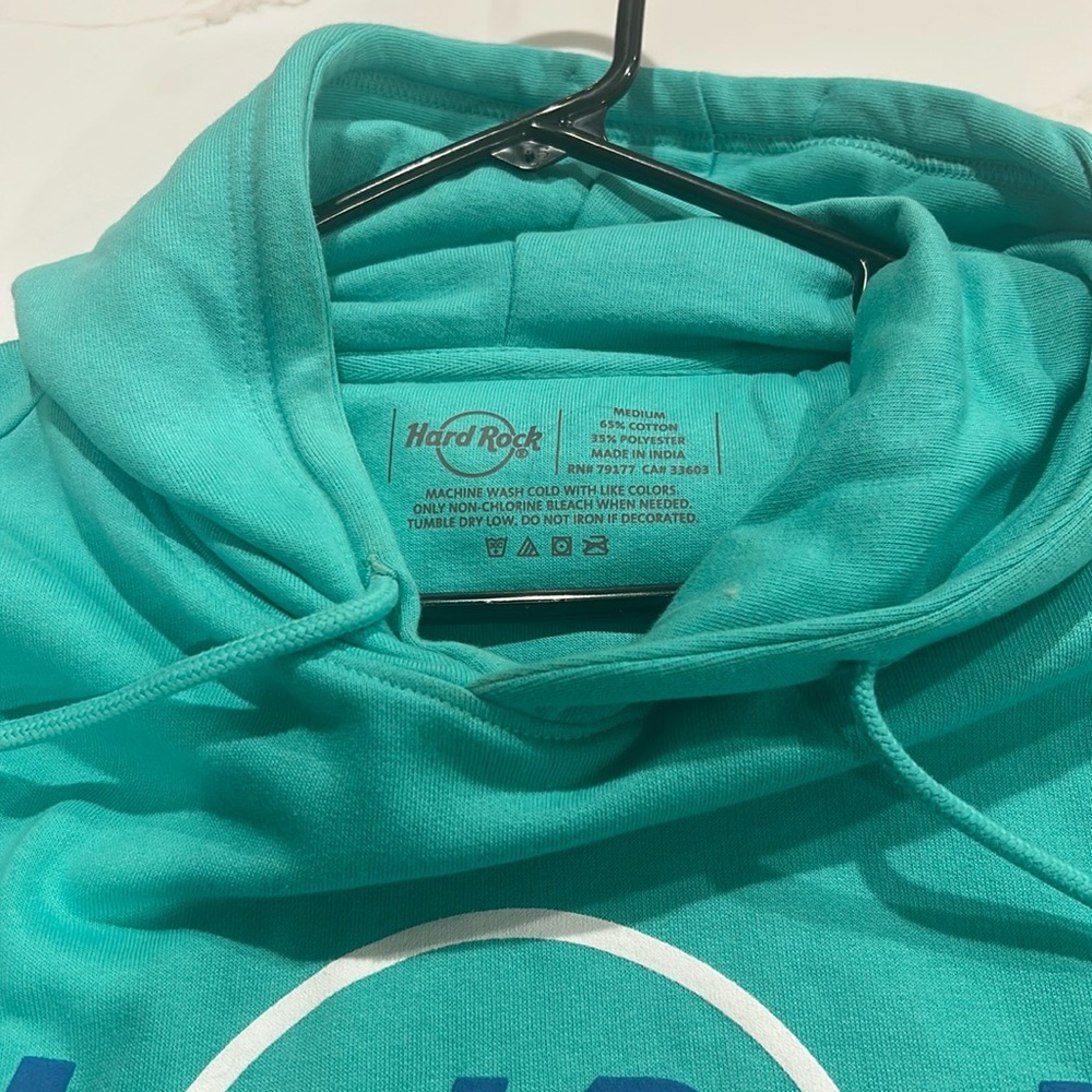 Woman’s like new no tags hard rock teal hoodie medium never worn!